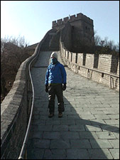 Ofer standing on the Great Wall of China